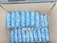 Light Blue Disposable Shoe Covers Elasticized Seam Fluid Resistant With Textured Tread supplier